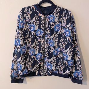 Fun, floral, lightweight spring bomber jacket- navy with pops of blue and coral